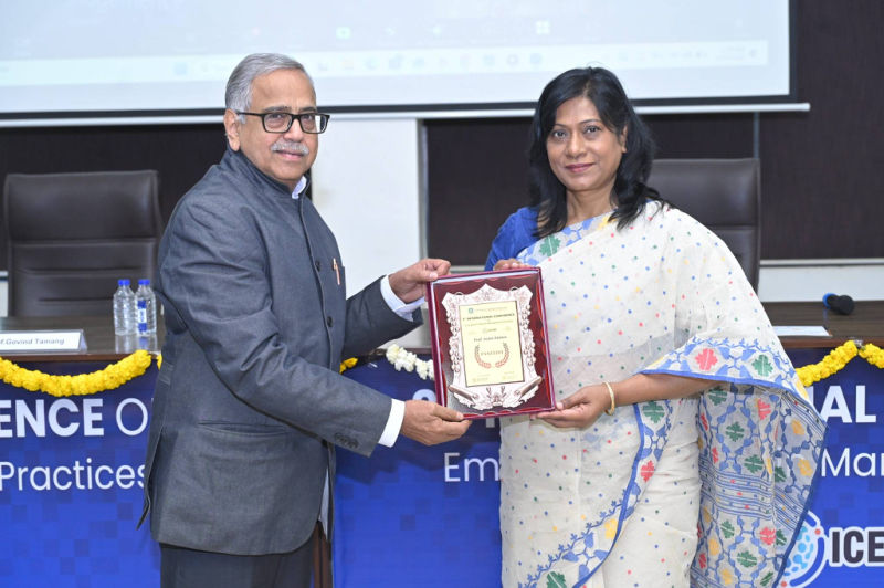 Panelist receiving a memento at the 3rd ICETMP