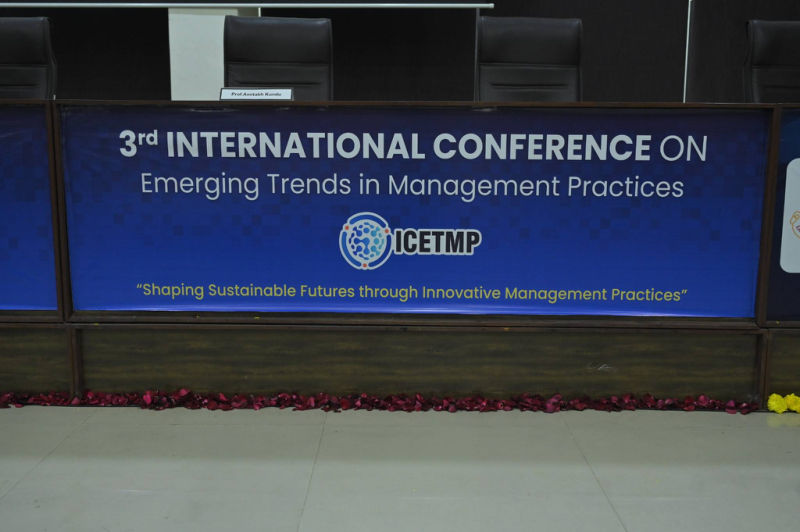 3rd International Conference on Emerging Trends in Management Practices stage backdrop