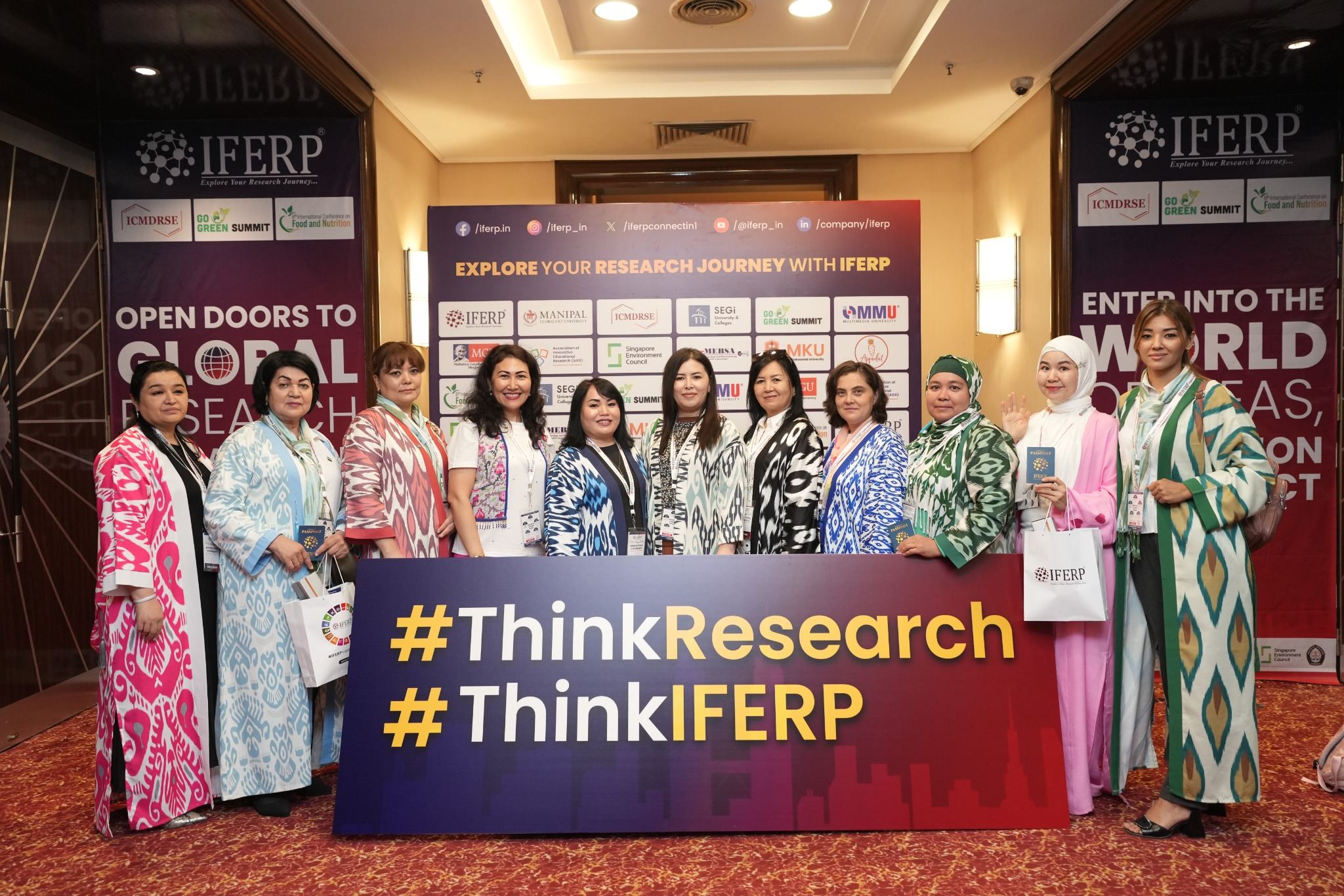 Women delegates in traditional dress at an IFERP international conference